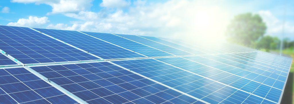 Friendly City Solar Program Hero solar panels with sunlight shining