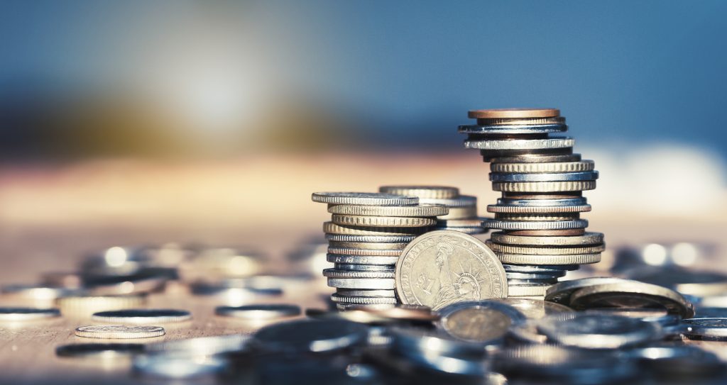 Energy Share Program Thumbnail coins stacked on top of each other
