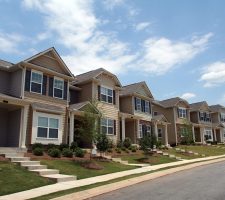 row of townhouses in suburban neighborhood